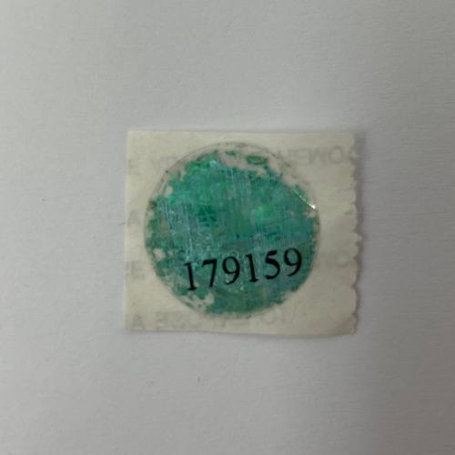 Small green stamp on a white background
